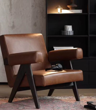 Premium leather armrest accent chair available in white, brown and bright orange.